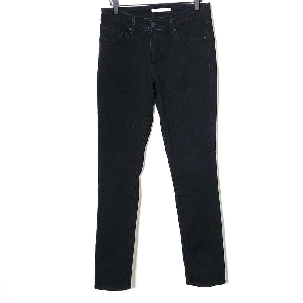 Levi’s black mid rise skinny jeans